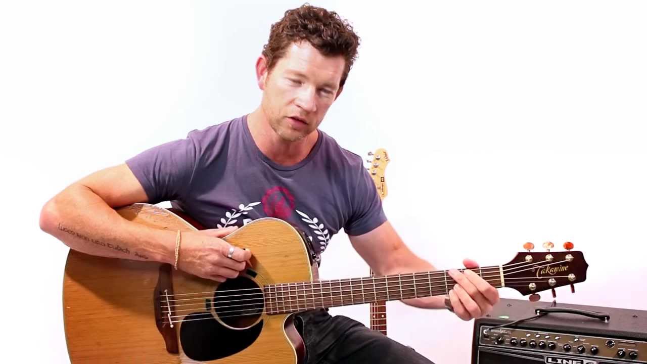 cách cầm đàn guitar