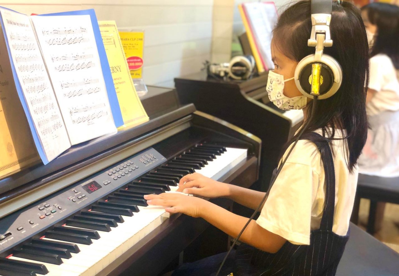 lợi ích học đàn piano